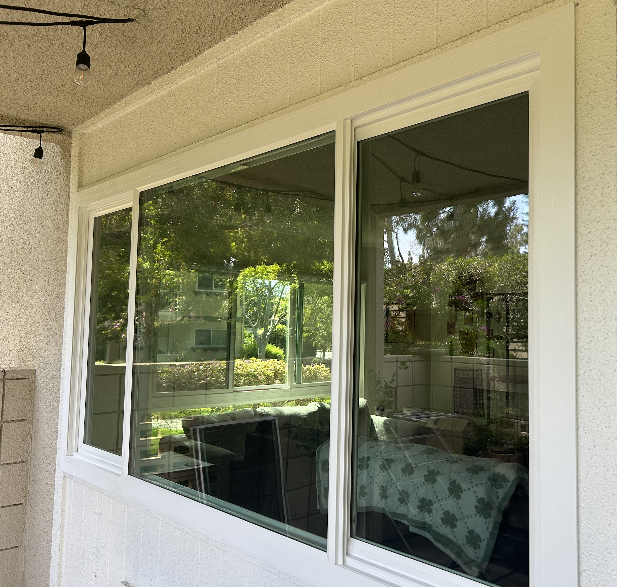 White vinyl retrofit window slider in a Laguna Woods Village living room